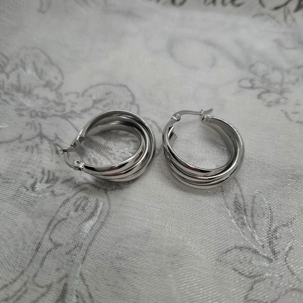 Boucles d'oreilles créoles entrelacées Naomie