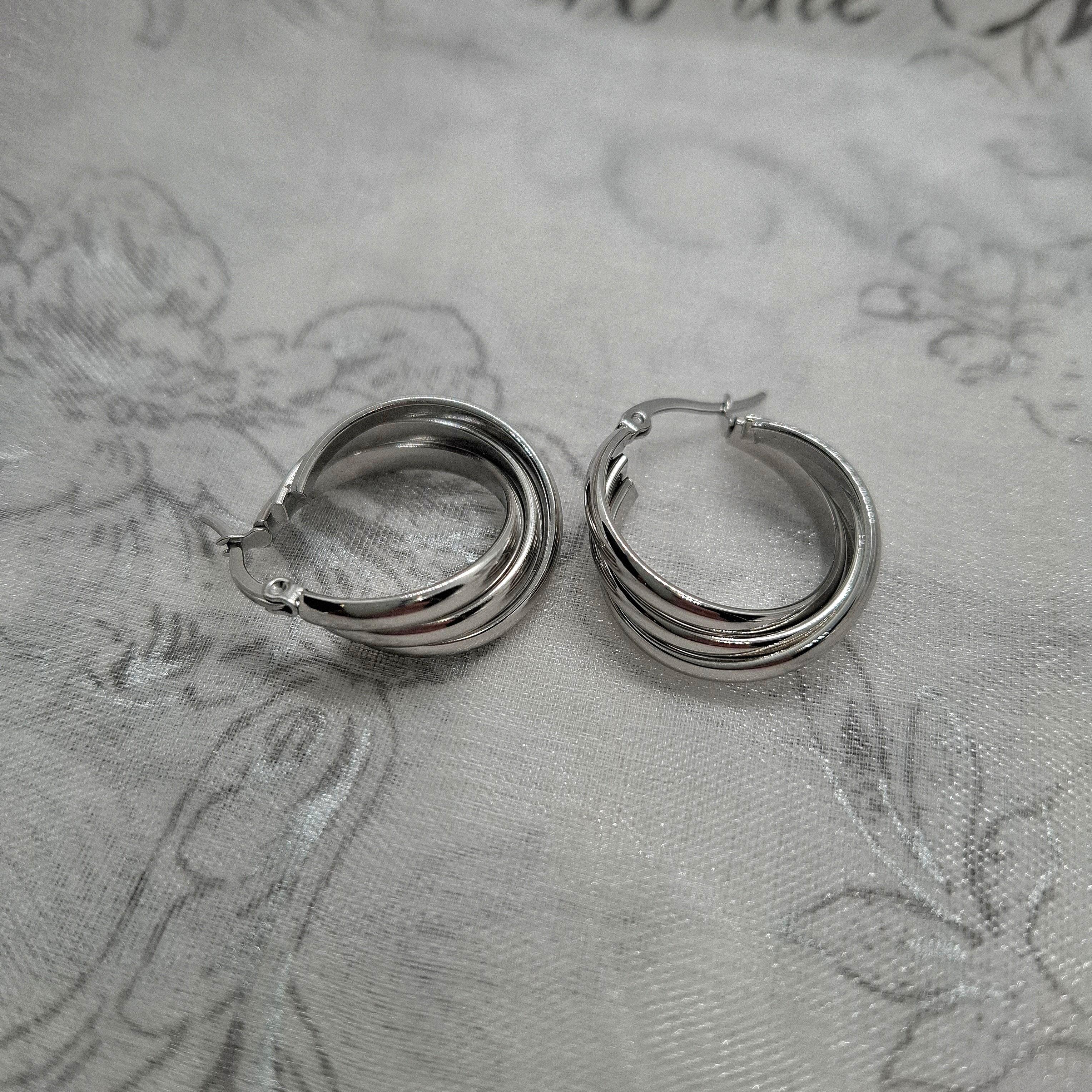 Boucles d'oreilles créoles entrelacées Naomie