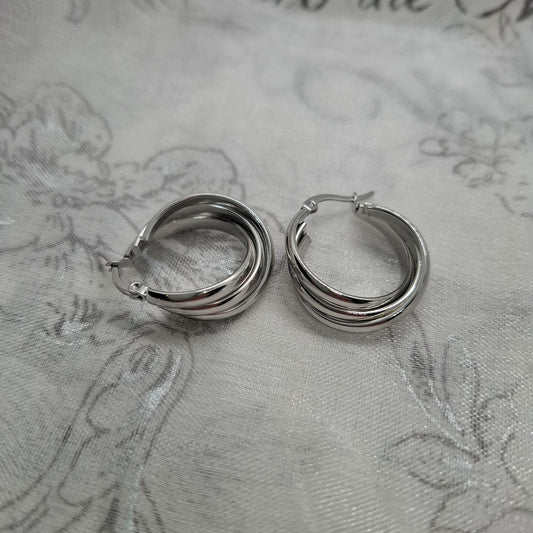 Boucles d'oreilles créoles entrelacées Naomie