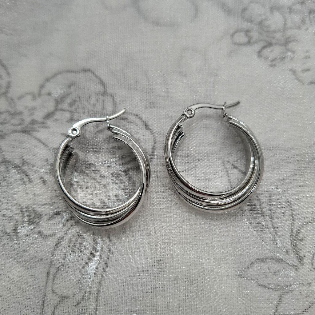 Boucles d'oreilles créoles entrelacées Naomie