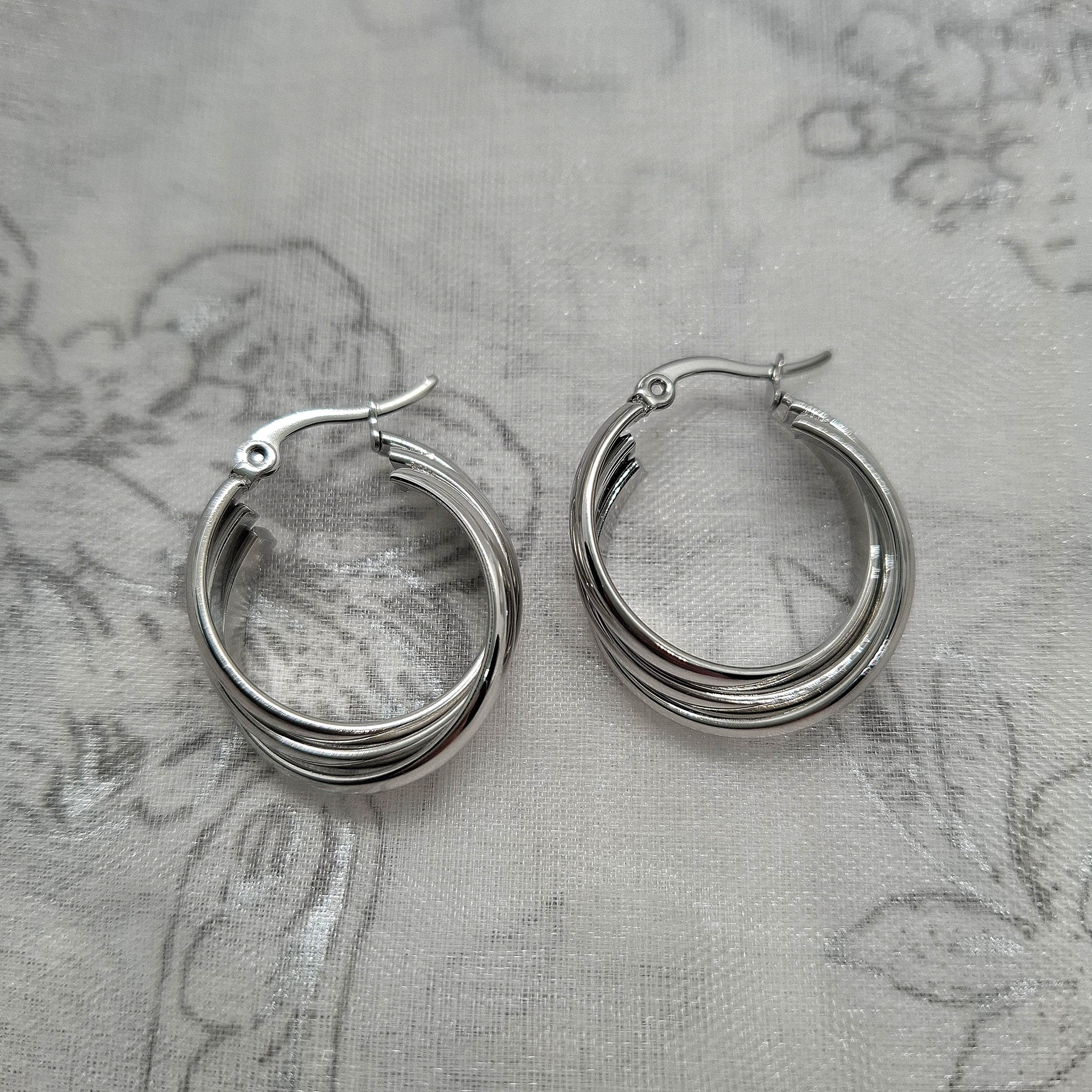 Boucles d'oreilles créoles entrelacées Naomie